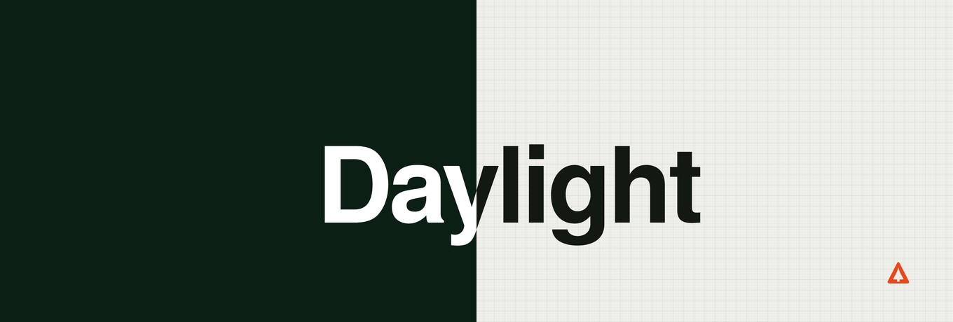 The word Daylight set across the seam between the dark Nightfall ground and the off-white Daylight ground
