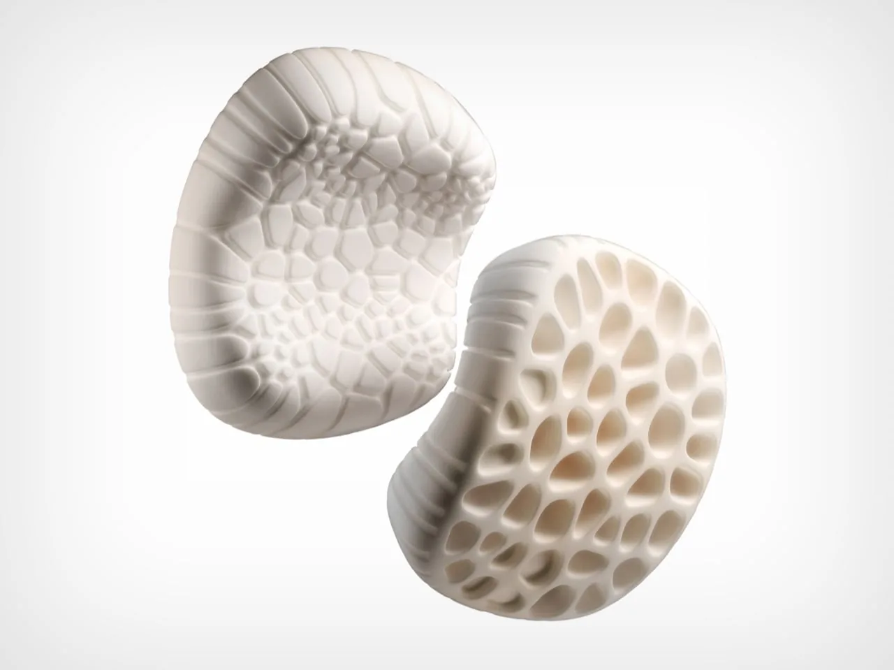 Two Camp Napper pillows, one showing the cell-textured top and one showing the underside